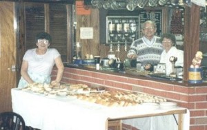 Margaret Green, cake-maker supreme and Ken & Olga Shackleton behind the bar.