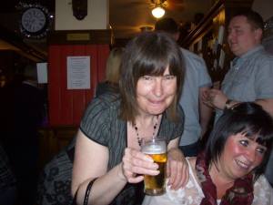 Our Jackie - rare picture showing her serving beer and not on a fag break